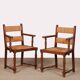 Pair of oak straw-seated armchairs from the 1950s.