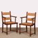 Pair of oak straw-seated armchairs from the 1950s.