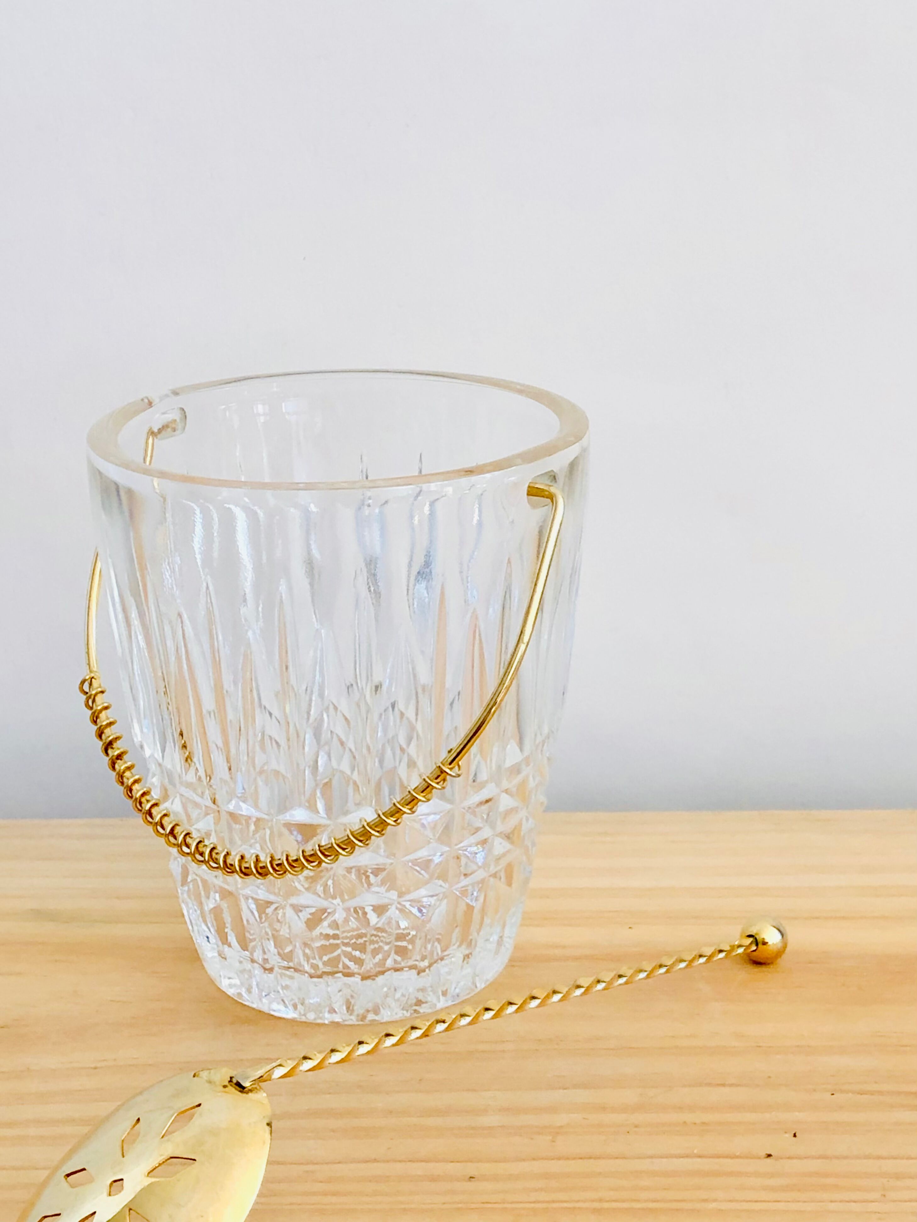 Crystal ice bucket and spoon thereof