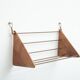 Wall-mounted walnut bookshelf by Carl Auböck, 1950s
