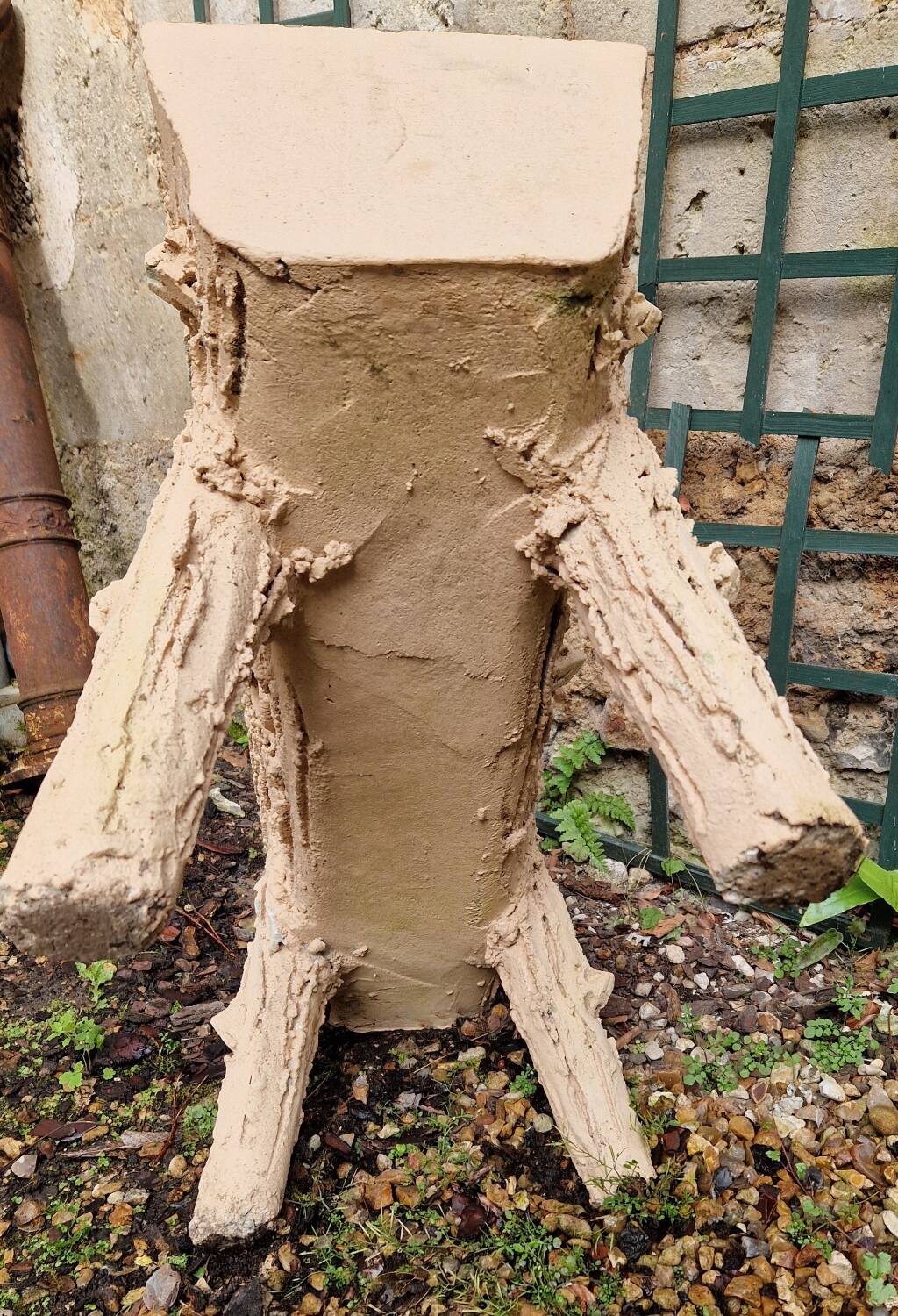 Pair of cement planters in faux wood finish