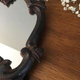 Vintage fiddle mirror to put down.