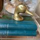 Décapsuleur "canard" en laiton doré vintage