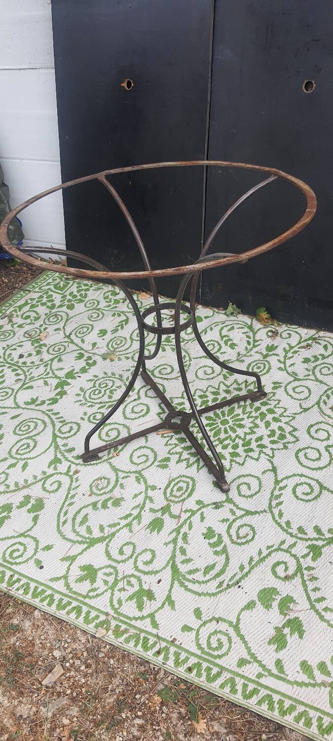 Wrought iron pedestal table