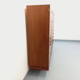 High Scandinavian modernist vintage sideboard in teak and black metal.