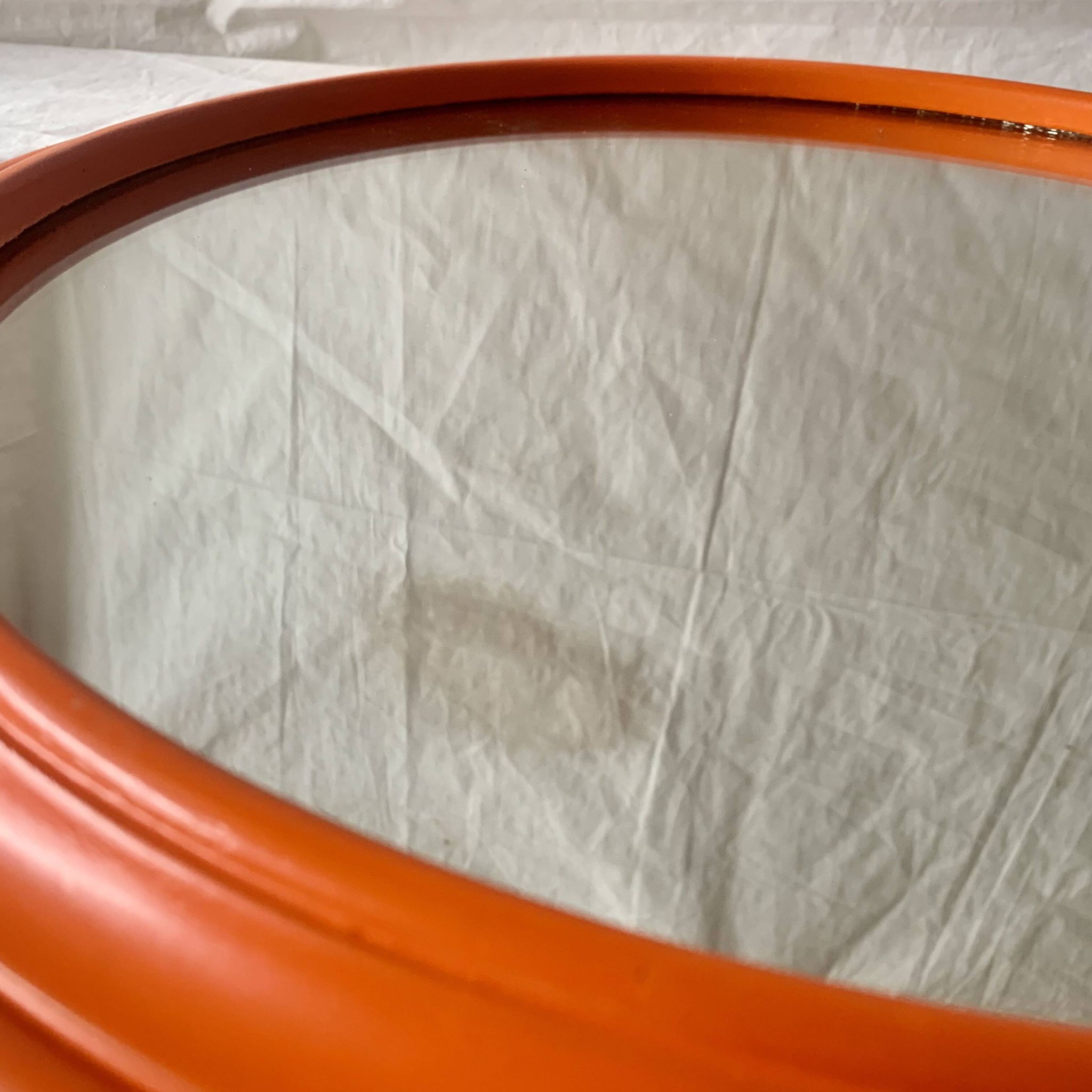 Vintage round wall mirror in orange painted wood - diameter: 48 cm