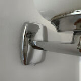 Chrome and opaline wall lights from the 70s.