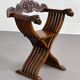 Fauteuil pliant vintage en bois sculpté