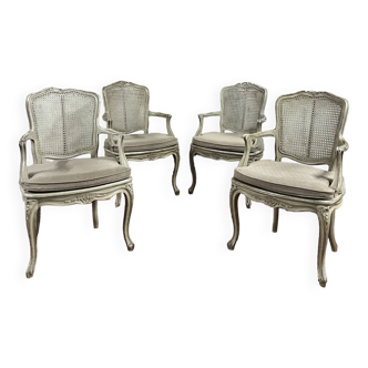 Suite de quatres fauteuil canné en bois laqué gris estampillé gouffé de style louis xv