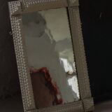 Wall mirror in tramp art style, hand-carved with a painted white frame, early 1900s.