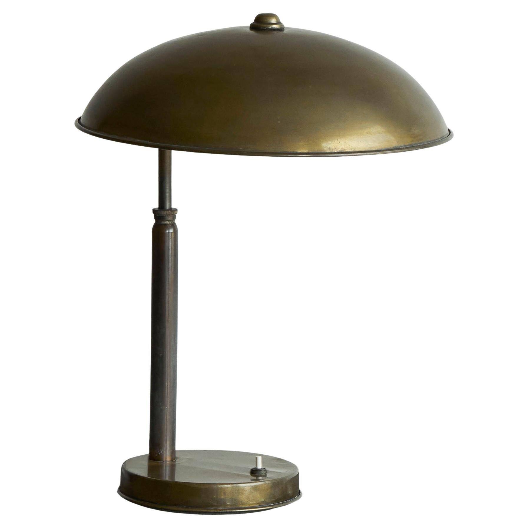 Bauhaus style table lamp in patinated brass from the 1930s.