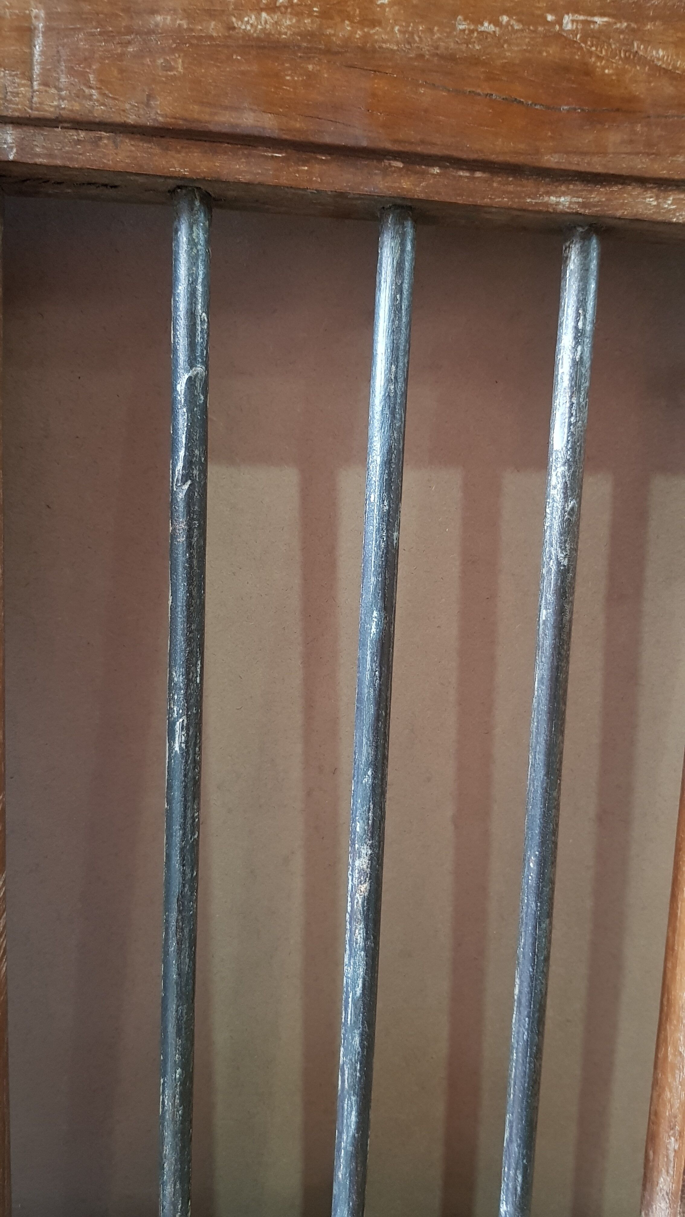 Old Burmese teak gate with openwork wrought iron panels