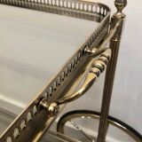 Neoclassical style rolling table in silvered brass