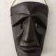 Ethnic ebony wood mask for display or hanging.