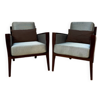 Pair of designer armchairs