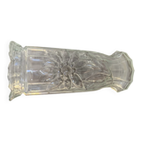 Transparent glass vase with relief floral decoration from the 1980s, fluted neck and polygonal base.