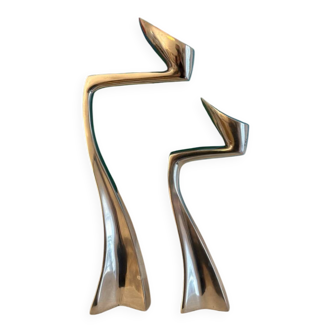 Set of 2 Swann candle holders by Matthew Hilton