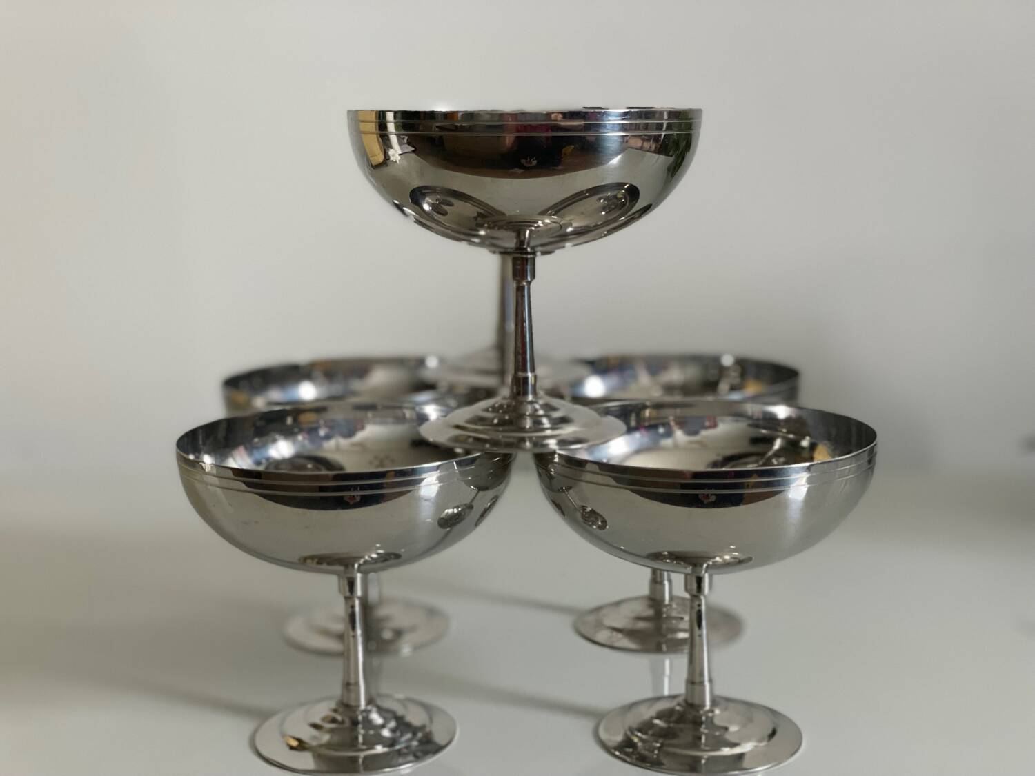 Six Guy Degrenne stainless steel ice cream cups.