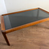Large Scandinavian coffee table in teak and smoked glass.