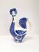 Large earthenware jug in the shape of a rooster.