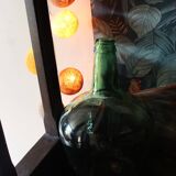 Dame Jeanne carboy from the Viresa collection in dark green glass