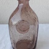 Biot bottle in bubbled glass