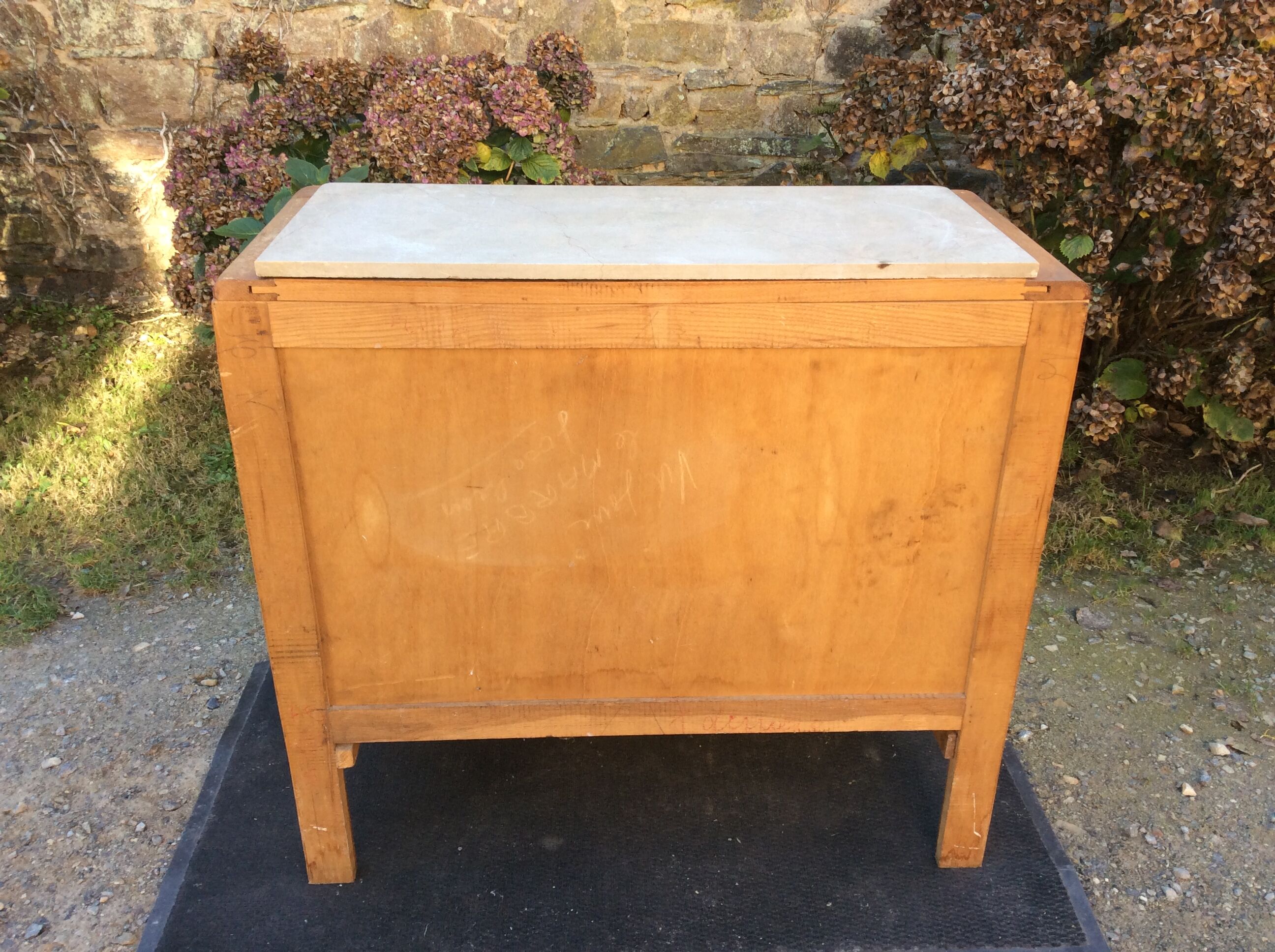 Vintage chest of drawers with oak compass base with marble top.