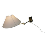 Danish Brass wall lamp with a ‘swivel’ effect.