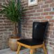 Chair 50 years in wood and faux black leather cocktail