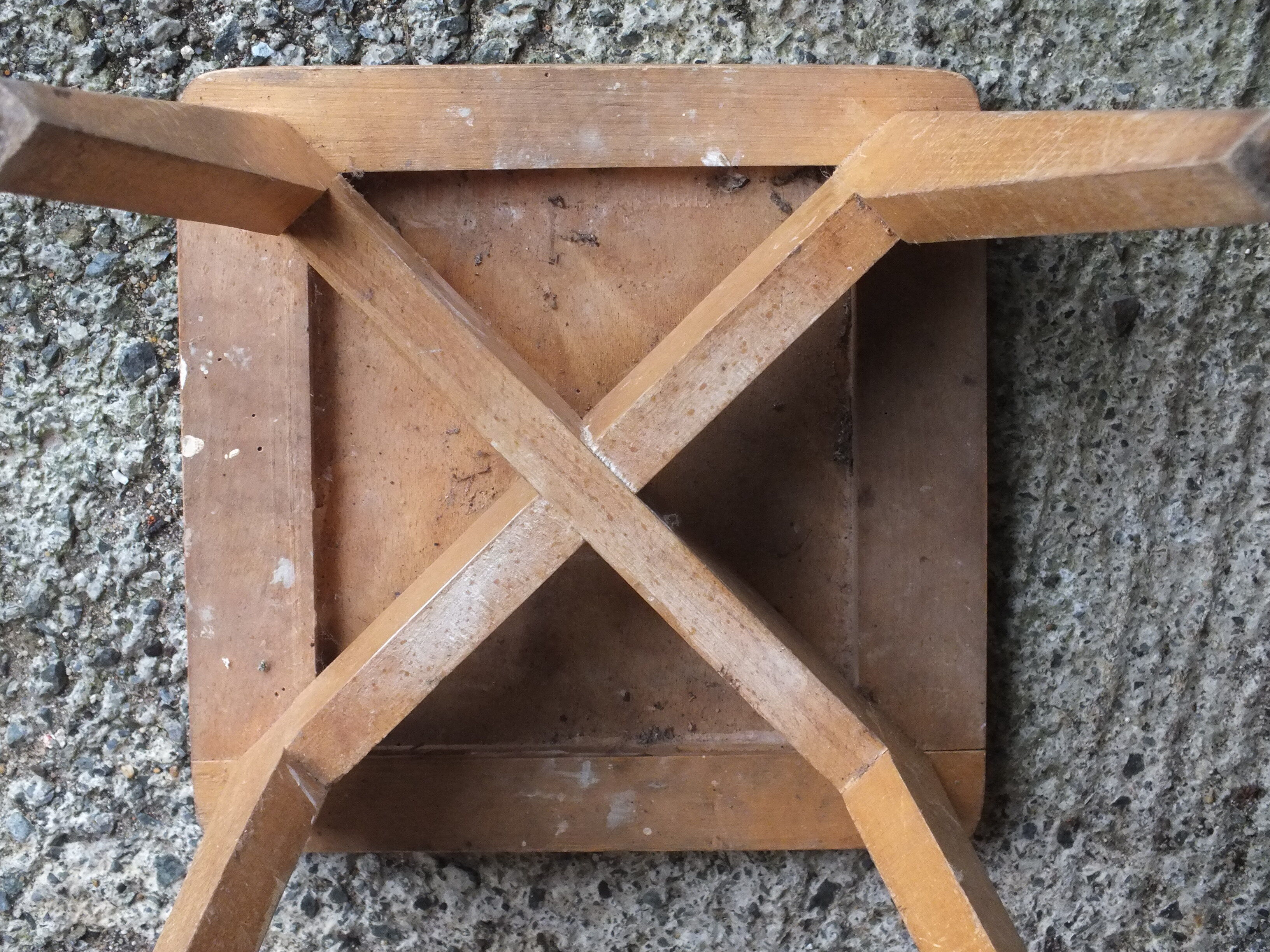 Vintage wooden stool with 4 legs from the 50s