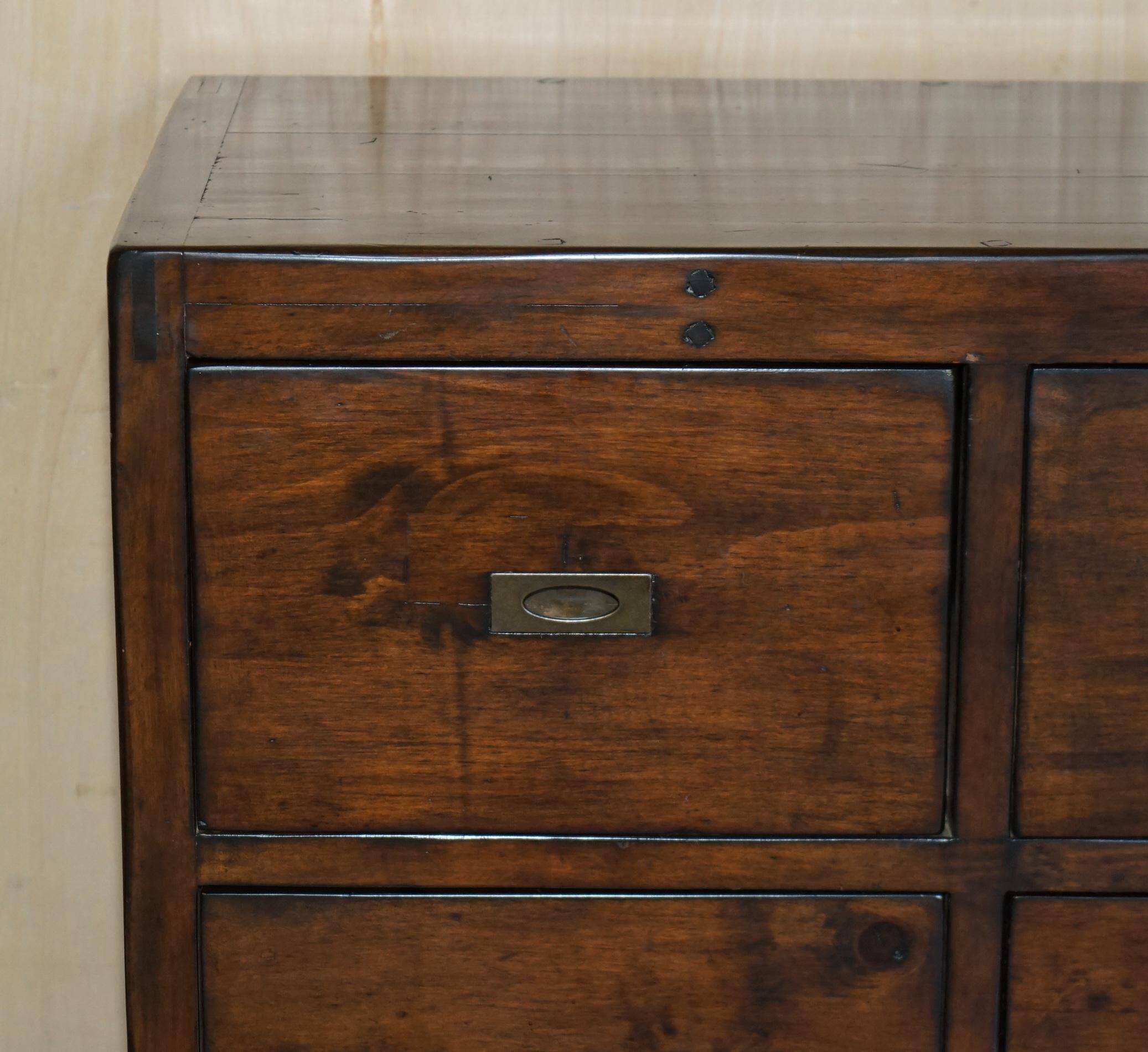 Large vintage hardwood furniture in military country style.