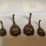 4 lion coat hooks in brass