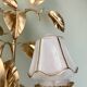 Vintage two-light wall lamp in gold metal with vintage art deco globes
