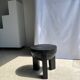 Black mango wood tripod side table with a semi-spherical top, height: 45 cm, diameter: 44 cm.