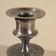 Pair of candlesticks in silver metal