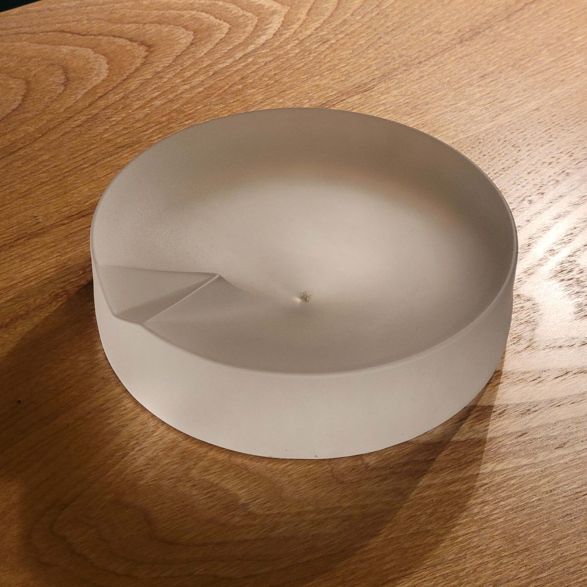 Empty ashtray pocket modernist design in satin molded pressed glass