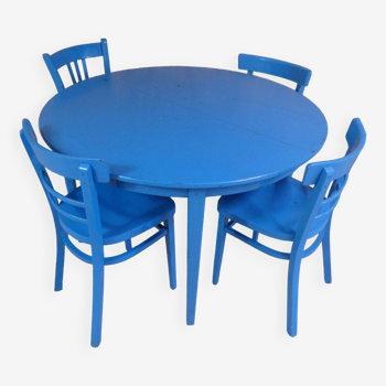 Round dining table with 4 chairs and 2 vintage blue extensions