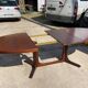 Baumann round oval extendable Scandinavian table in rosewood with 2 extensions.
