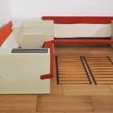 Modular sofa lacquered white and orange fabric