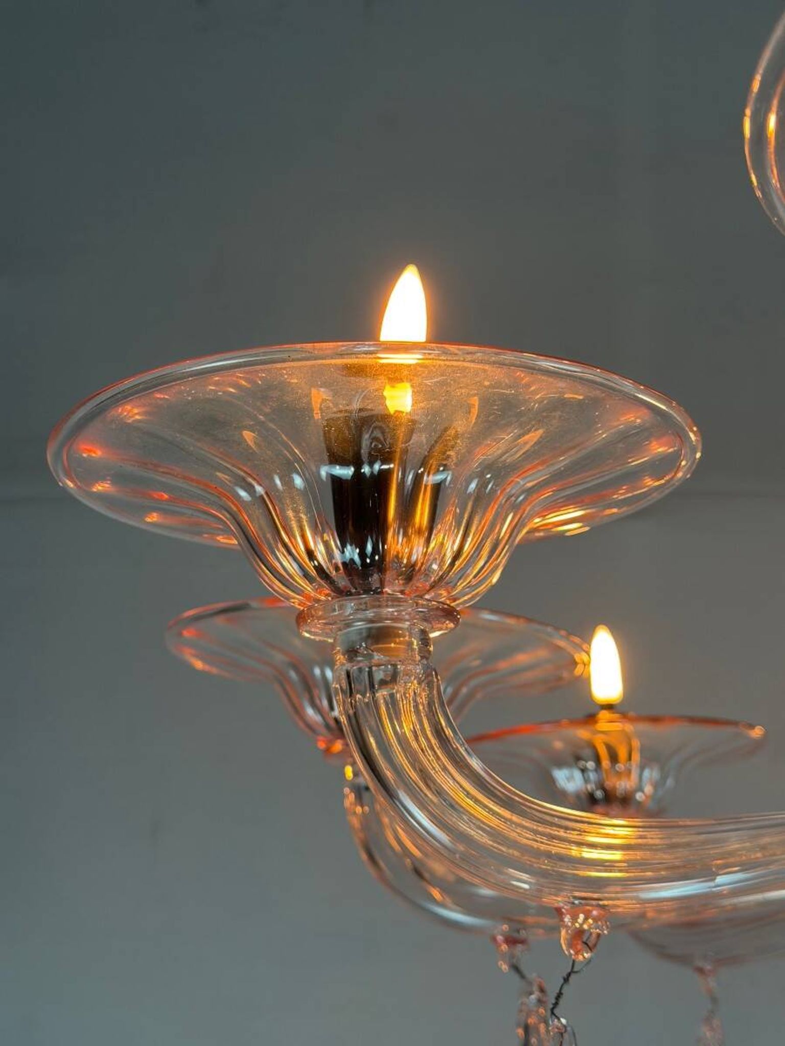 Venetian glass lustre in pink, in the style of Venini.