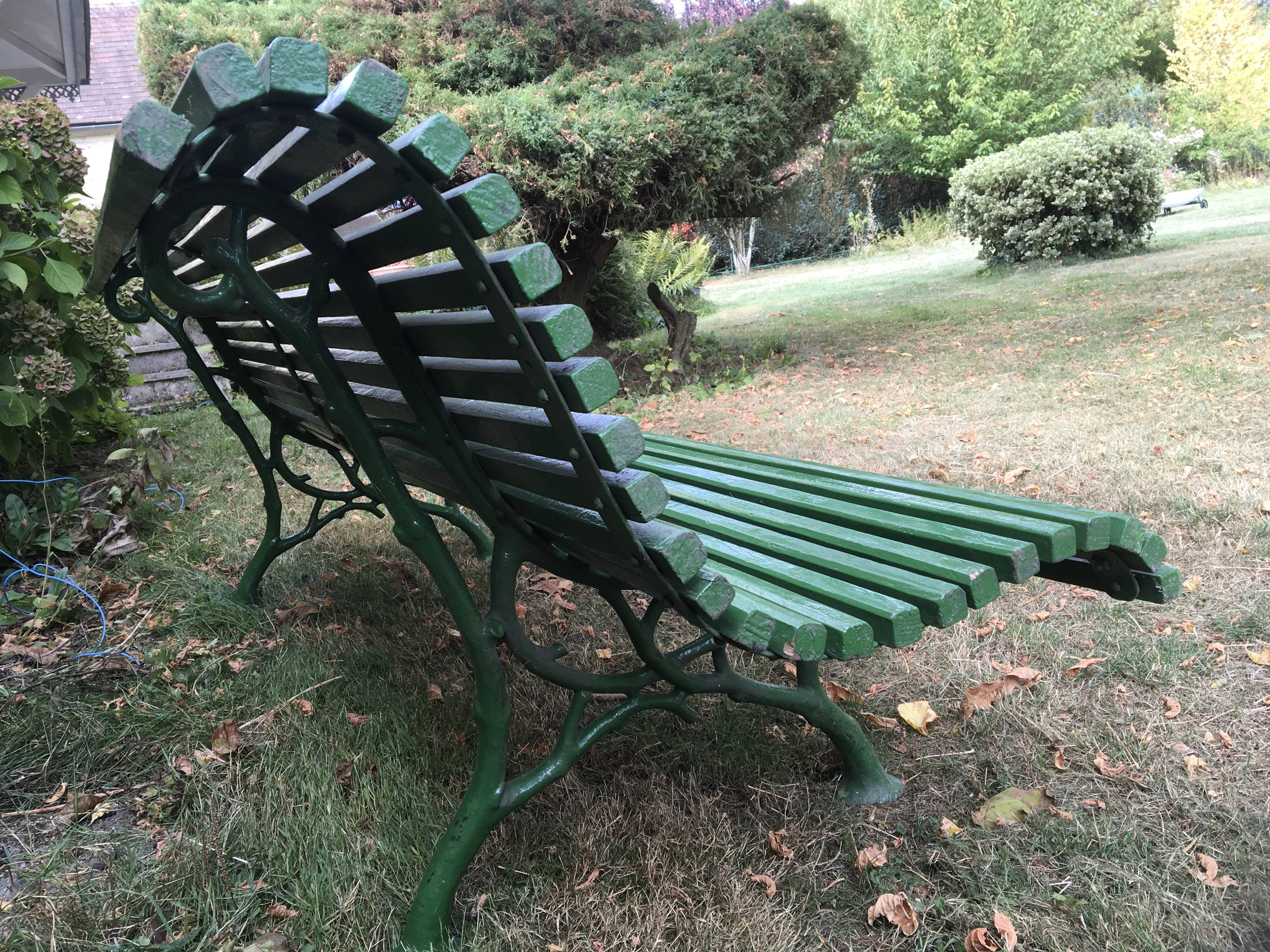 Garden bench in oak and foot in cast iron