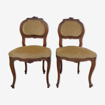 Pair of Louis XV chairs in carved walnut
