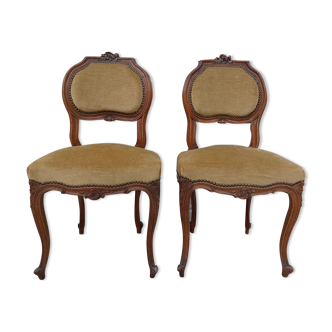 Pair of Louis XV chairs in carved walnut