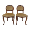 Pair of Louis XV chairs in carved walnut