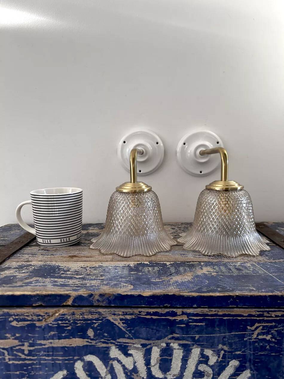 Pair of gold wall sconces