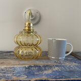 Vintage wall lamp in gilded chiseled glass