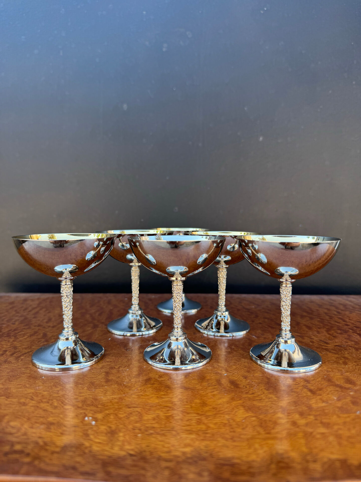 Silver-plated metal wine glasses on stems from the 1970s.