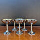 Silver-plated metal wine glasses on stems from the 1970s.