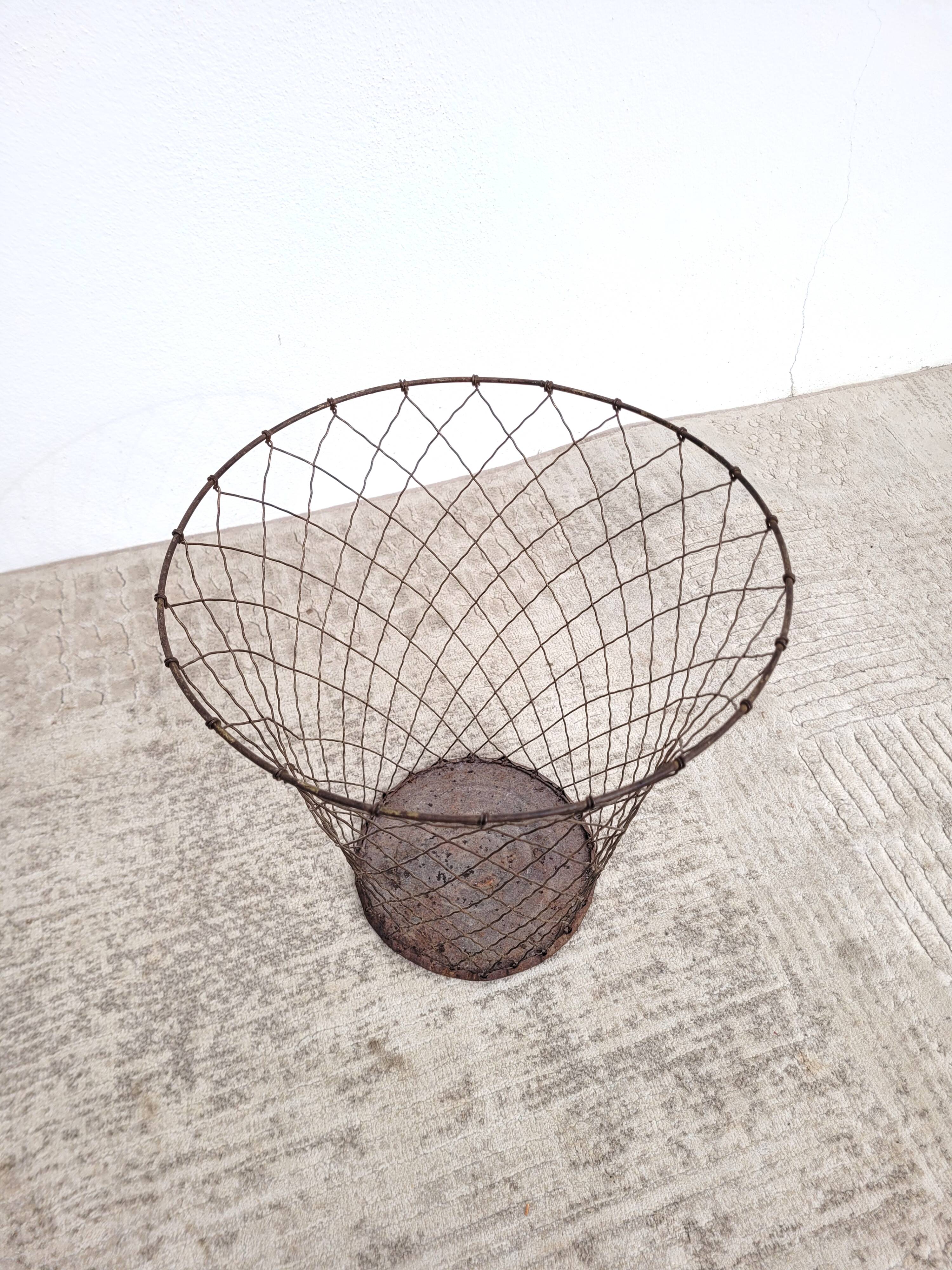 Old wire mesh wastebasket