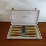 Lot 12 Art Deco style knives in case